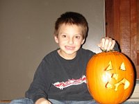 Ethan with pumpkin